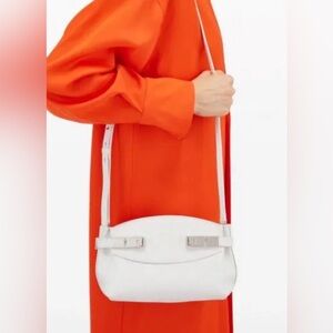 FERRAGAMO
Small Hug Leather Crossbody Bag white